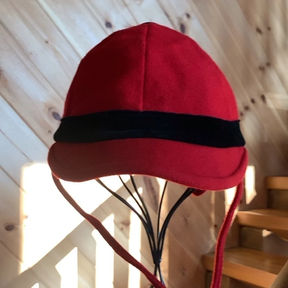 Kid’s dressy red trapper style hat with black velvet trim